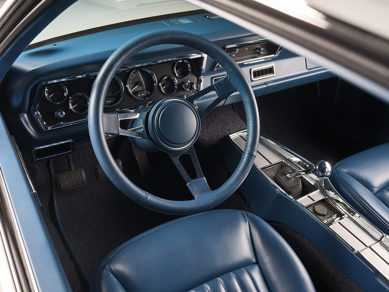 1971 Plymouth Duster custom interior steering wheel gauges blue upholstery pro touring restomod cockpit