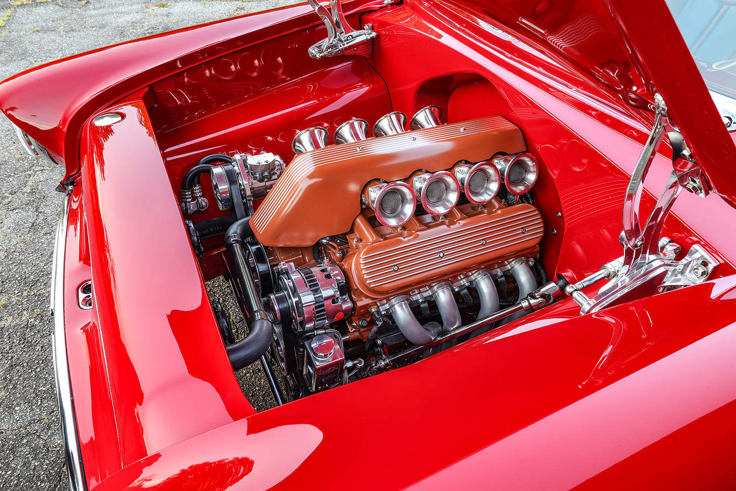 55 Chevrolet Bel Air custom V8 engine bay detailed intake stacks polished components show car quality