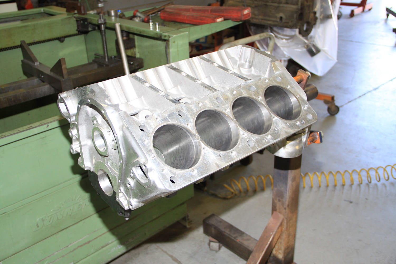 aluminum engine block with reinforced valley getting machined