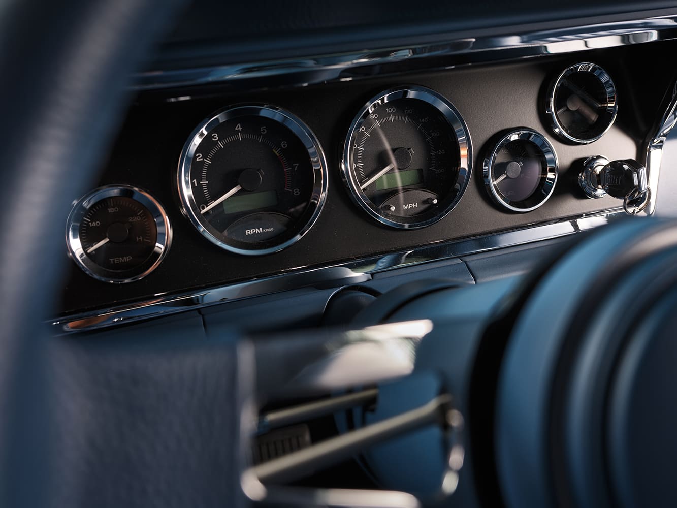 1971 Plymouth Duster custom gauge cluster close up modern instrumentation pro touring interior detail