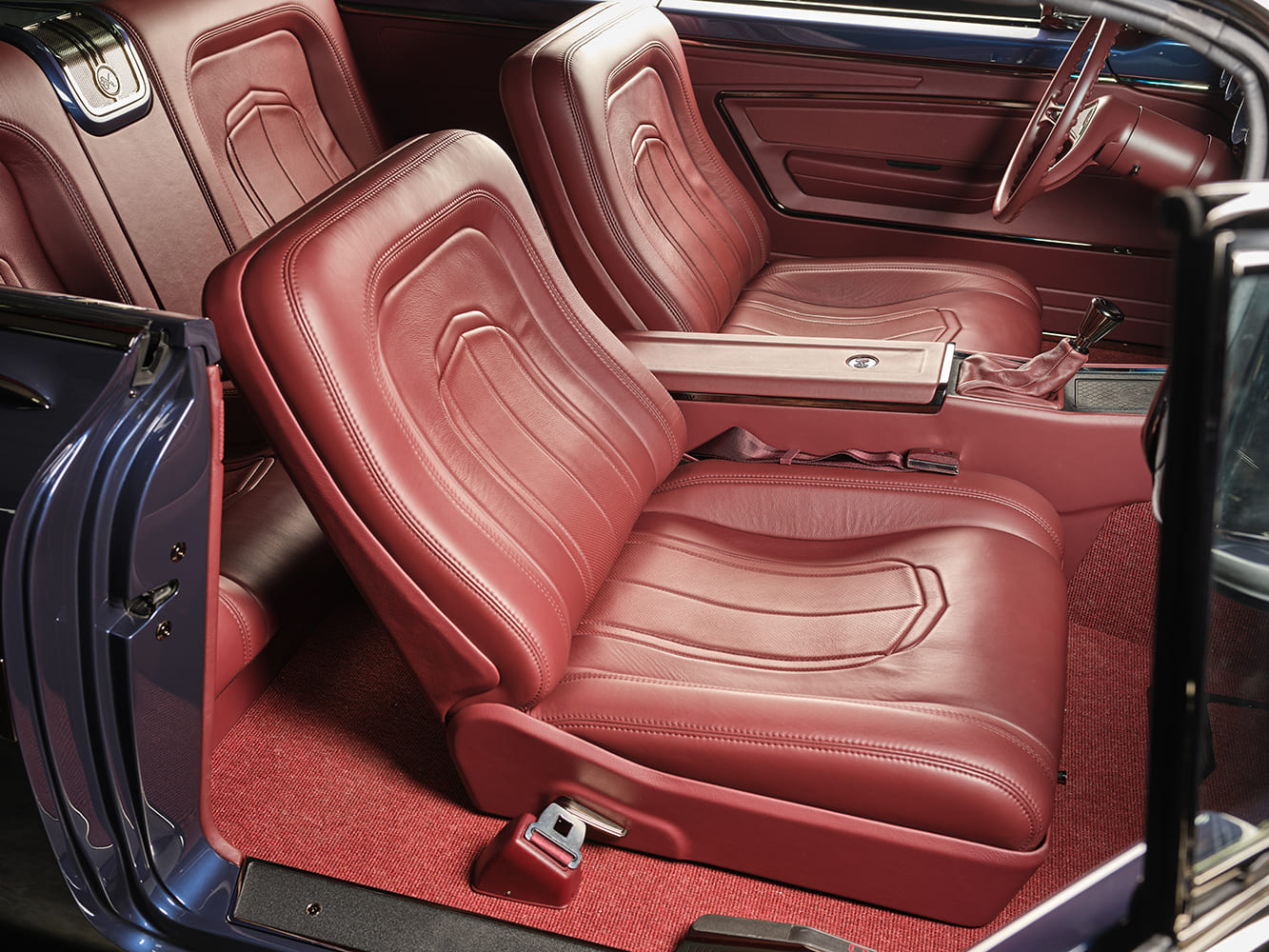 1959 Chevrolet Impala interior seat detail red leather bucket seats custom upholstery classic style
