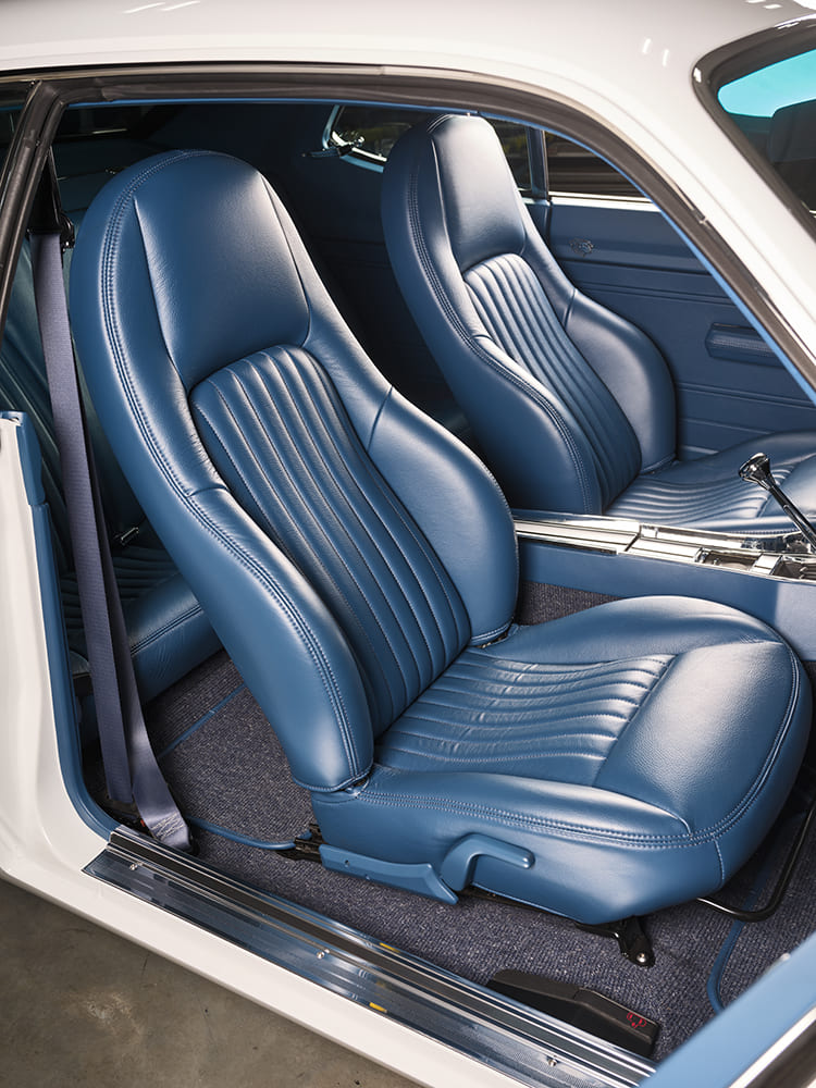 1971 Plymouth Duster custom blue bucket seats interior upholstery detail pro touring muscle car cabin