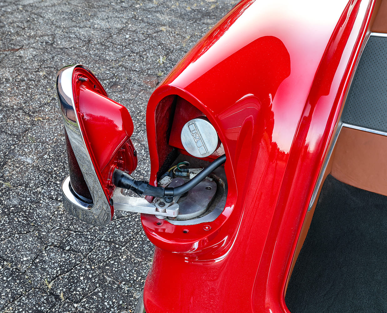 55 Chevy Bel Air custom fuel filler tail fin detail classic rear quarter gas cap vintage design