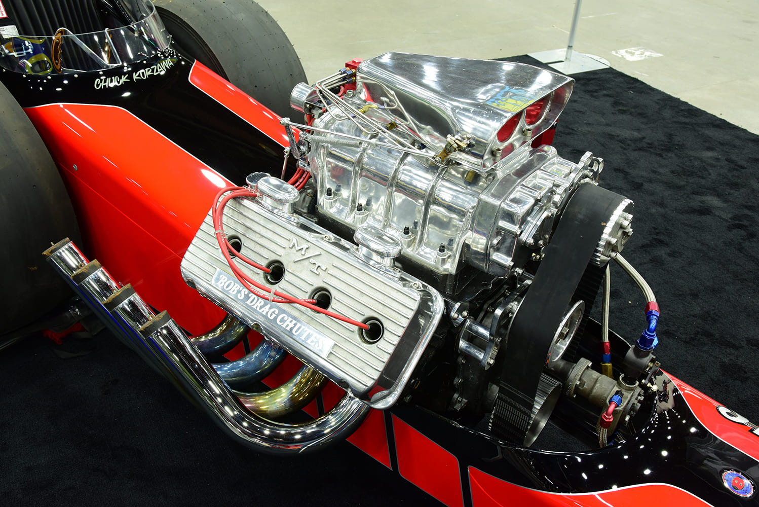 fuel injected supercharged hemi in front engine dragster.