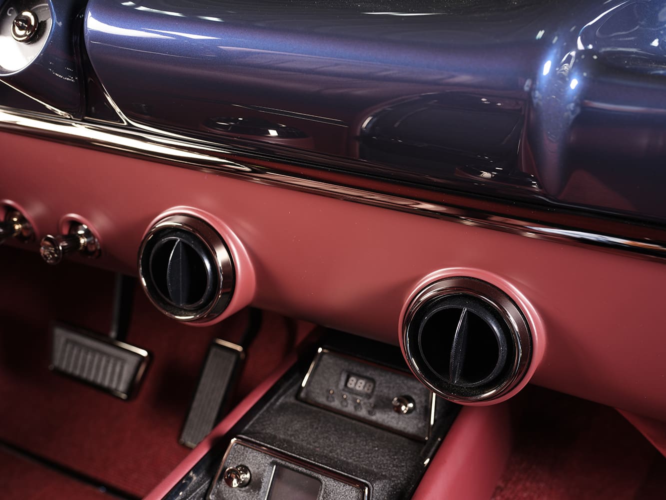 1959 Chevrolet Impala dashboard vent detail close up red interior chrome trim custom classic styling