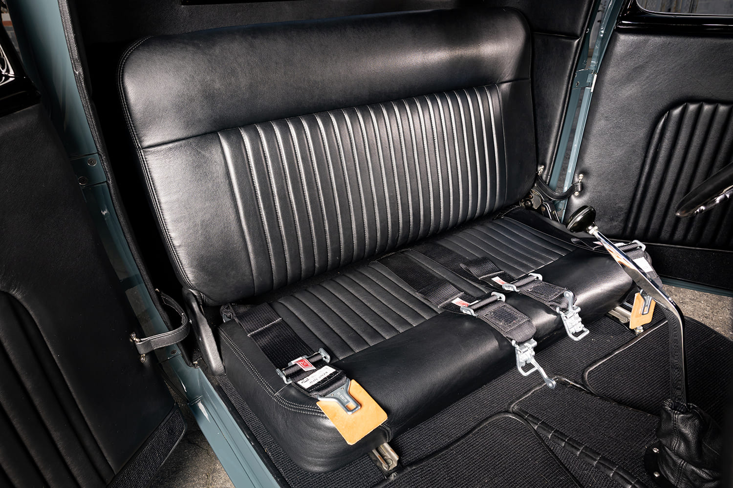 33 Ford hot rod interior bench seat harness belts black upholstery custom cabin detail
