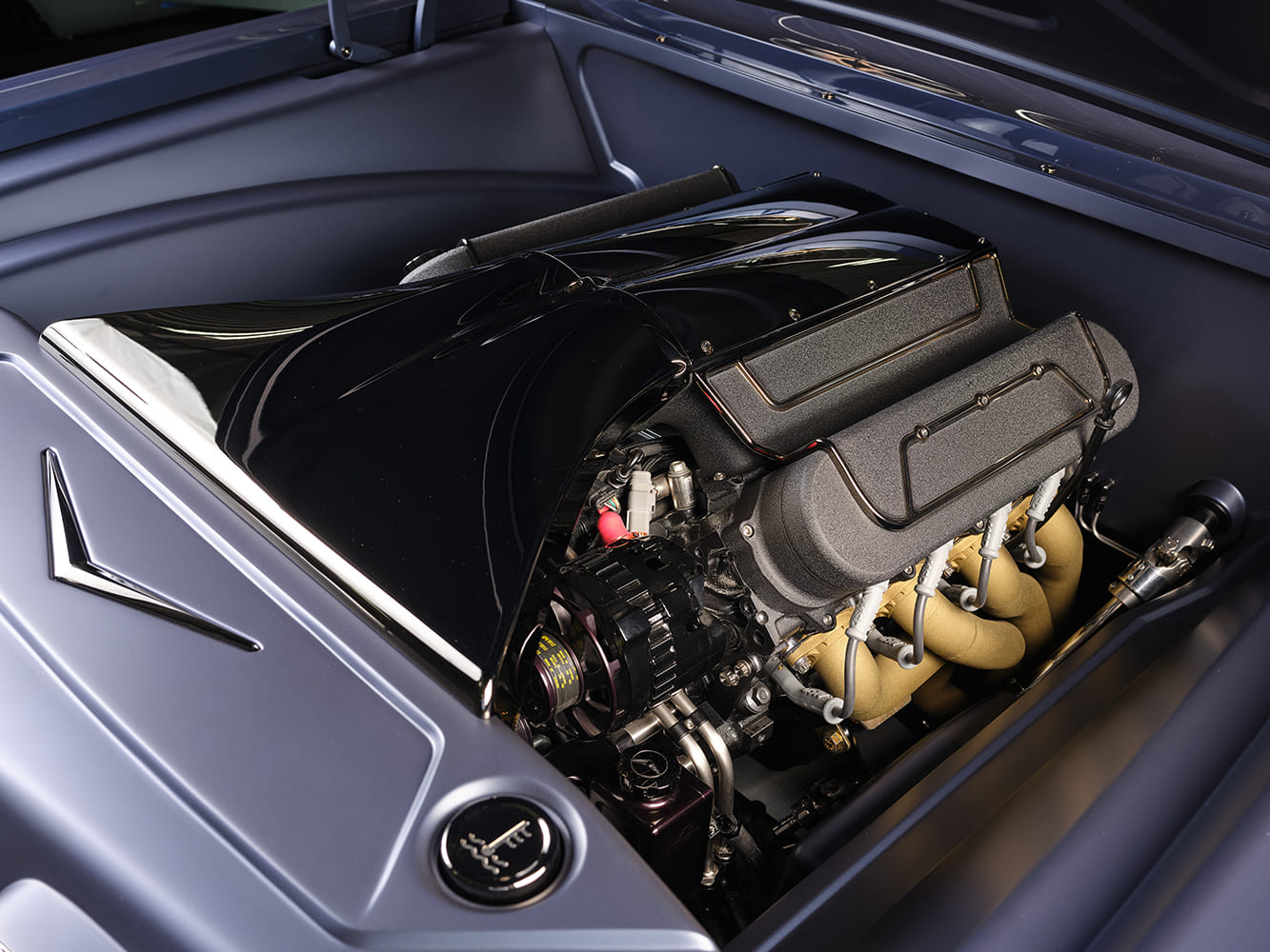 1959 Chevrolet Impala rear engine bay custom setup exposed motor polished components classic build