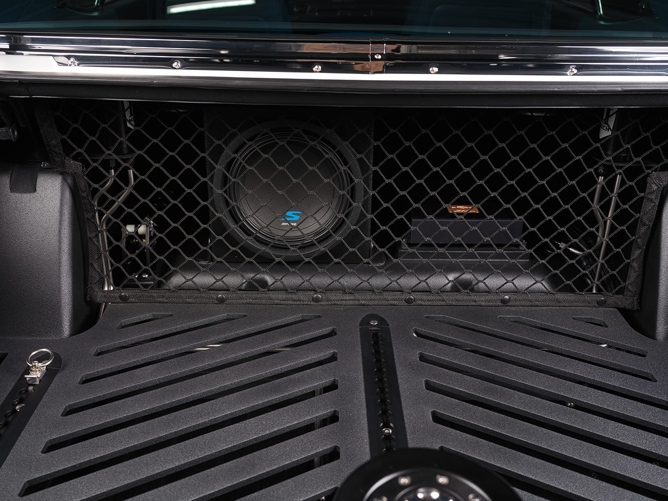 1971 Plymouth Duster trunk audio setup subwoofer amplifier custom installation pro touring build