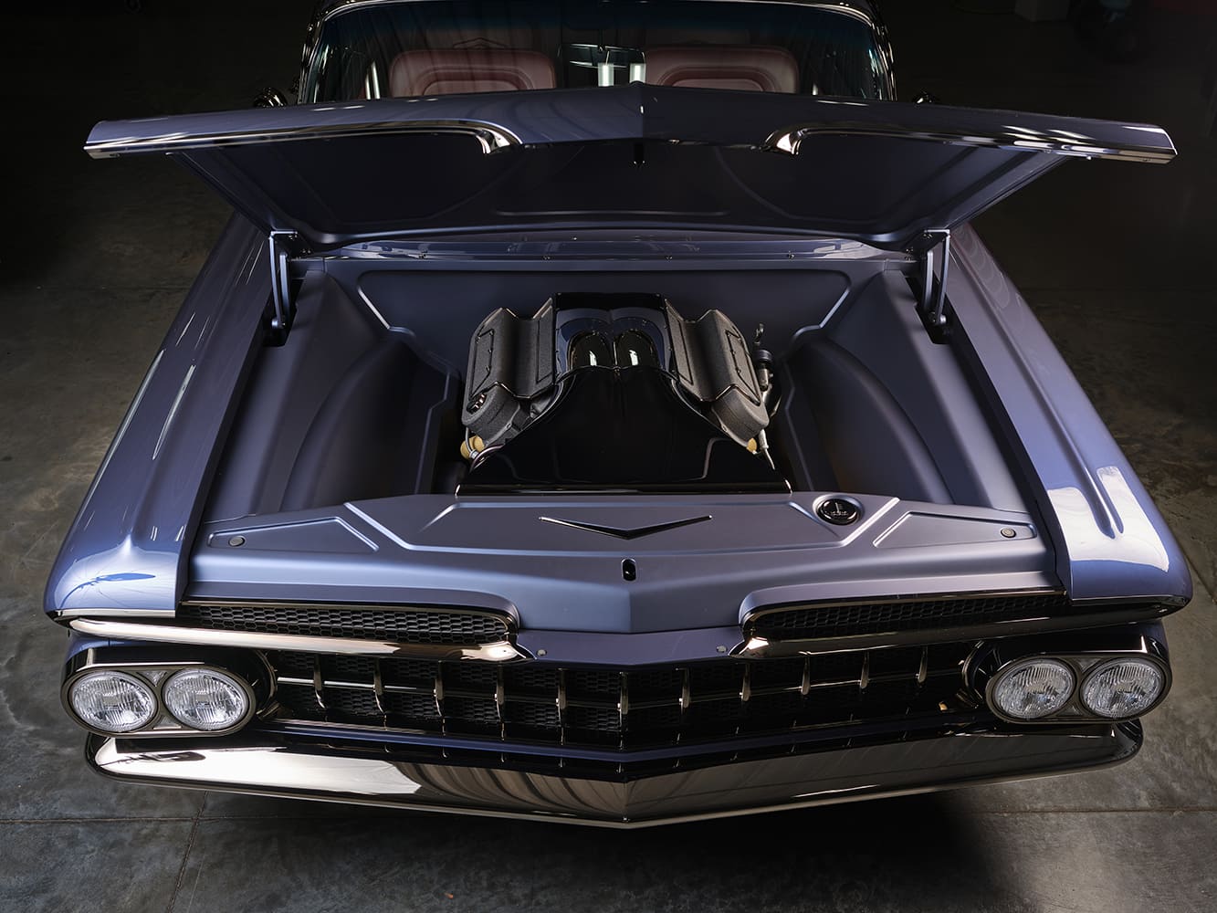 1959 Chevrolet Impala front hood open view custom engine bay grille headlights classic show car