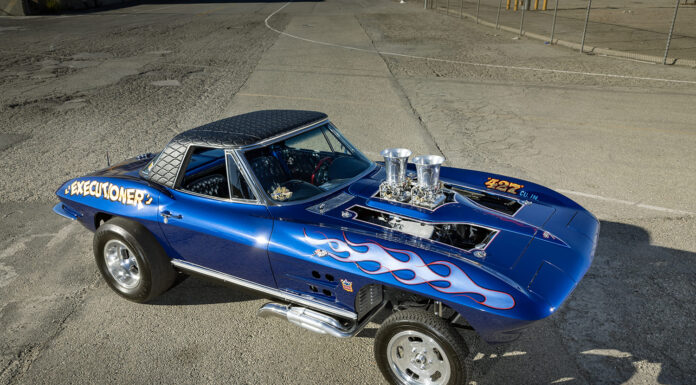 Wild Historical Gasser-Style 1964 Corvette High-angle view of a blue 1964 Corvette gasser showing the diamond-stitched vinyl roof and dual velocity stacks through the hood.
