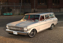 High front three-quarter perspective of a 1962 Chevrolet Nova station wagon showing the sunlit patina hood, chrome front bumper, and lowered pro-touring stance.