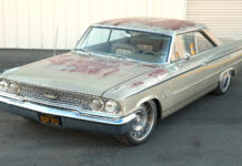 High front three-quarter view showing the weathered original factory paint across the hood and roof, pinched Ogden chrome bumper, and California plate BDP 822.