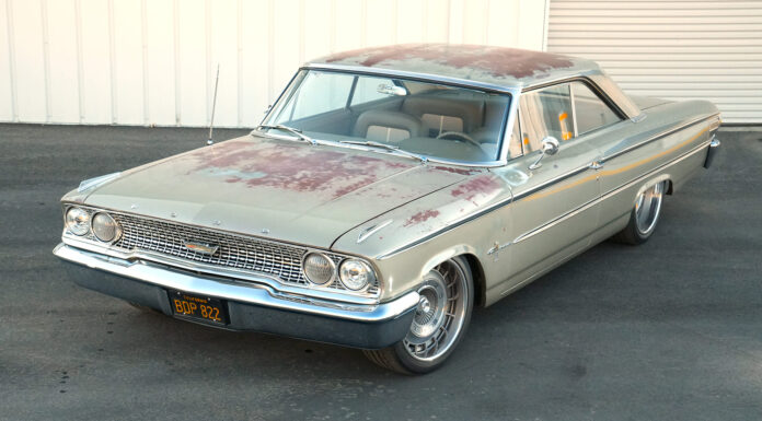 High front three-quarter view showing the weathered original factory paint across the hood and roof, pinched Ogden chrome bumper, and California plate BDP 822.
