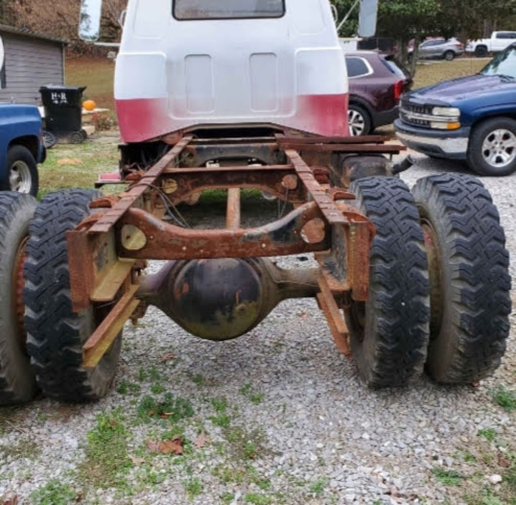 Rear view of the shortened 1967 GMC 7500 medium-duty frame rails and heavy-duty dually axle prior to mounting the custom pickup bed.