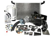 Complete Old Air Products CAP-8812E Hurricane AC and heating system kit showing condenser, compressor, evaporator unit, lines, and hardware for 1988 to 1994 GM trucks.